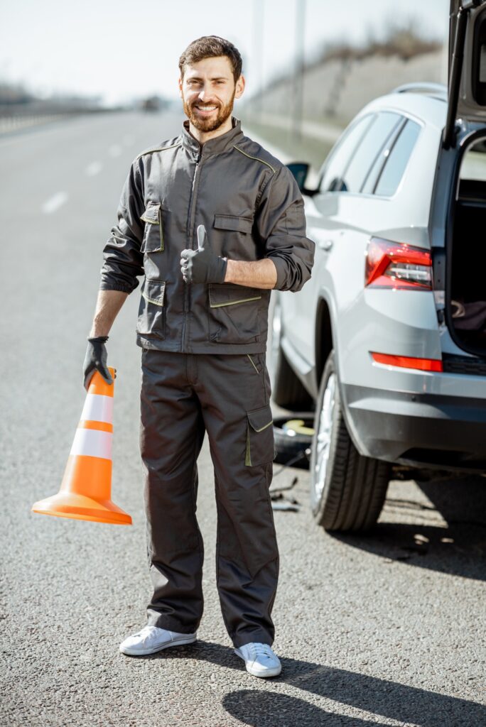 Road assistance worker on the roadside